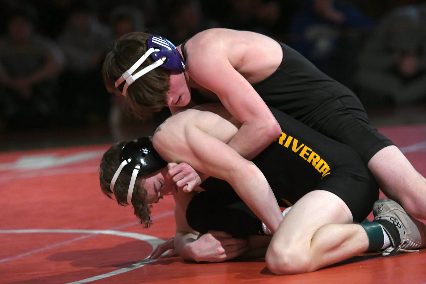Dixon's Ayden Rowley (top) wrestles Riverdale's Tharren Jacobs for third place at 113 pounds during the 1A Oregon Wrestling Sectional on  Saturday. Rowley won the match. Both advance to the state finals.