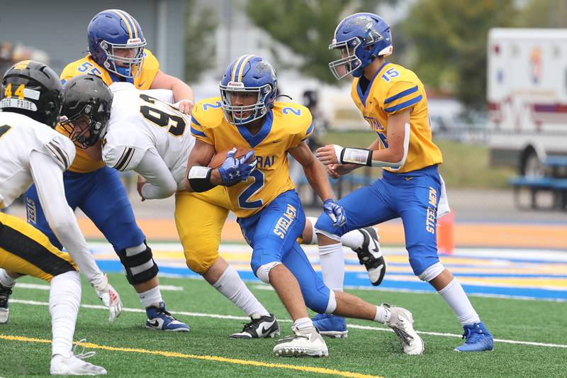 Joliet Central’s Christian Smith breaks the line of scrimmage against Joliet West on Saturday, Sept. 28, 2024 in Joliet.