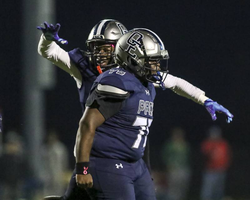 Oswego East's Daemyen OBannon (75) runs off of the field after making a key stop in the backfield during football game between Yorkville at Oswego East Friday, Oct 10, 2025 in Oswego.