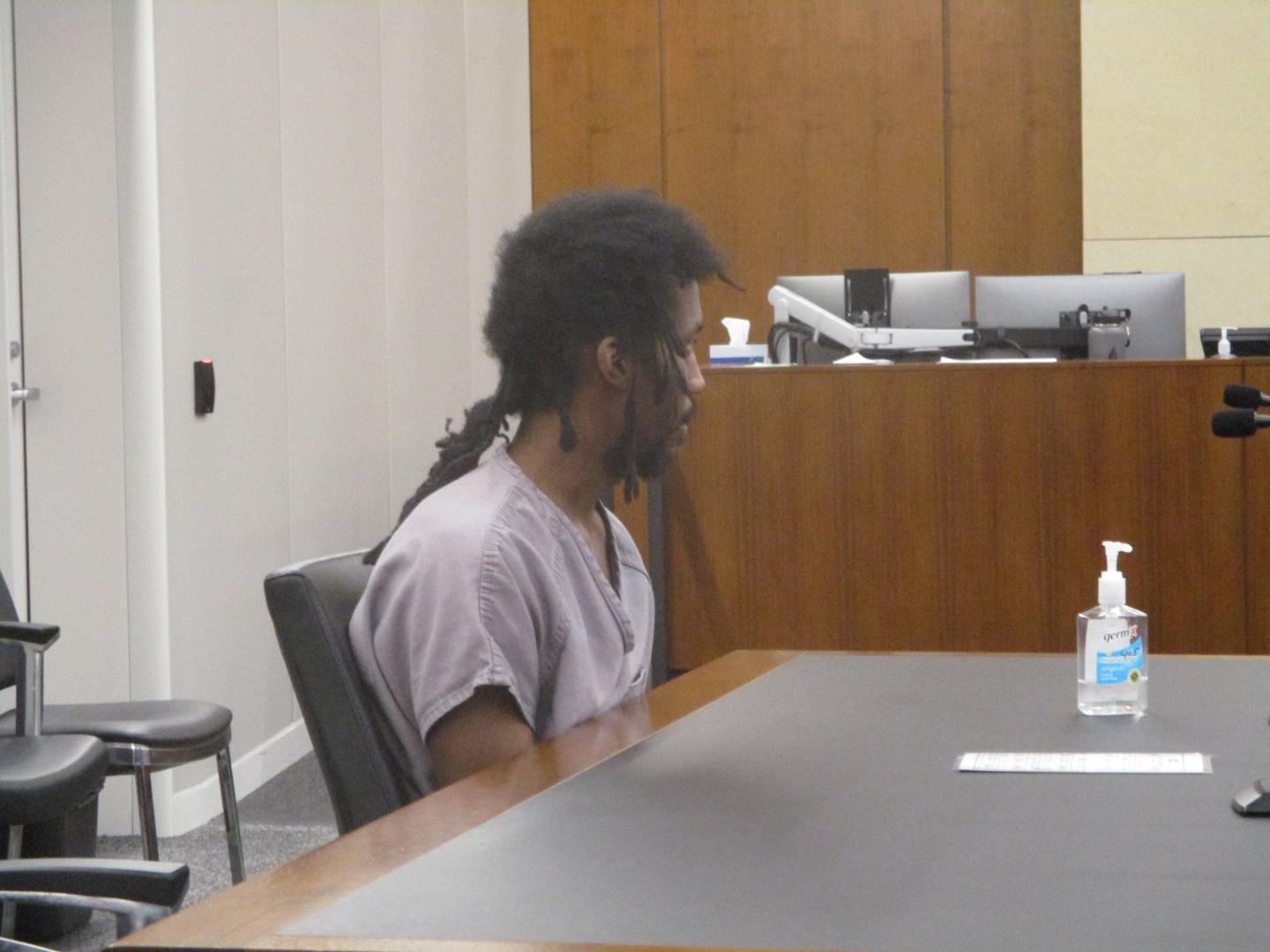Robert Watson sits alone at a table in a Will County courtroom as he is pronounced guilty but mentally ill for first-degree murder on Friday, May 12, 2023, in Joliet.
