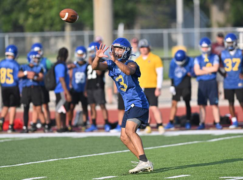 Joliet Central's Christian Smith catches a pass during the 7-on-7 scrimmage on Tuesday, July 25, 2023 in Morris. (Dean Reid for Shaw Media)
