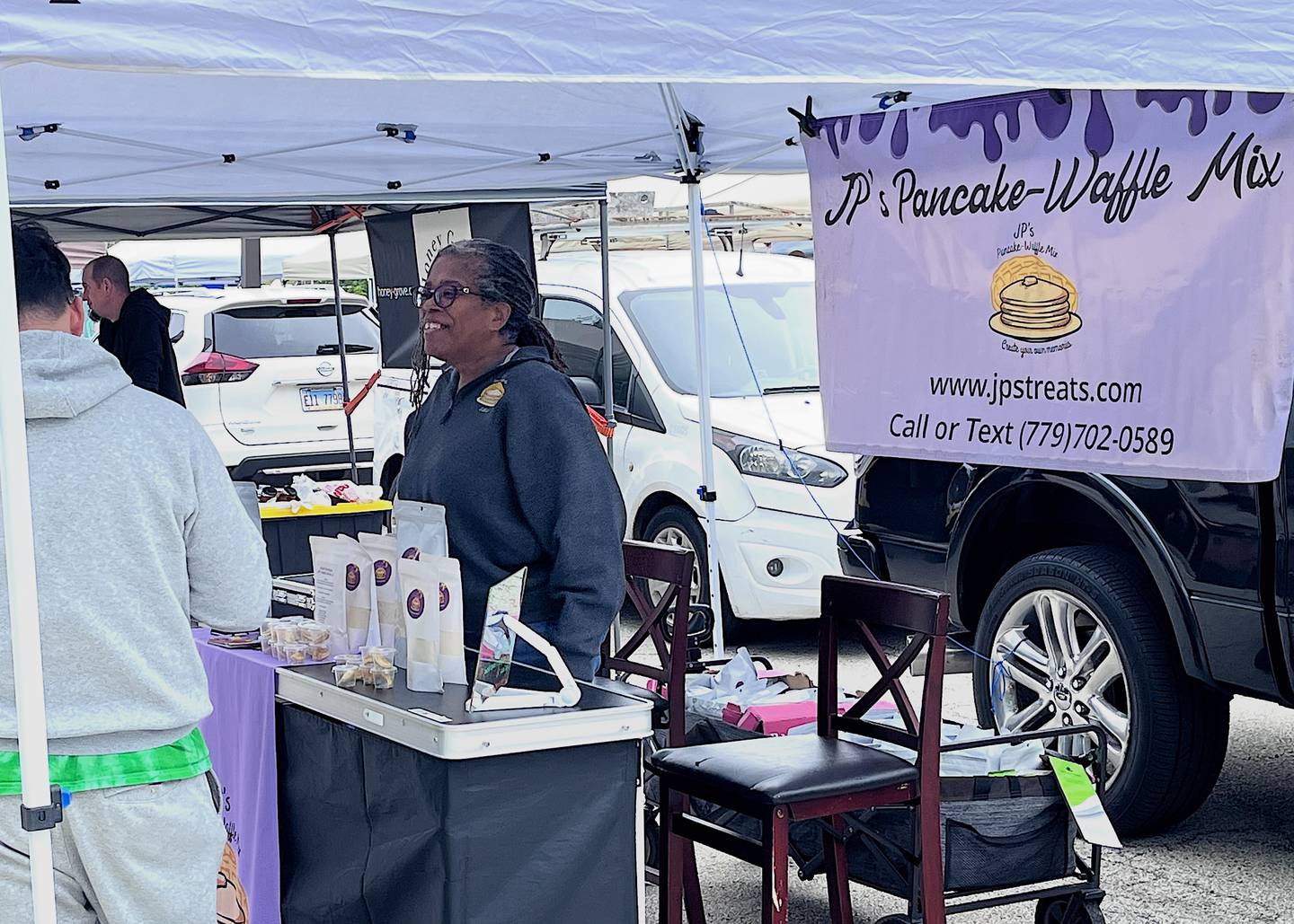 A booth for JP's Pancake-Waffle Mix on Saturday, May 23, 2026, at Lockport Trackside Farmers Market.