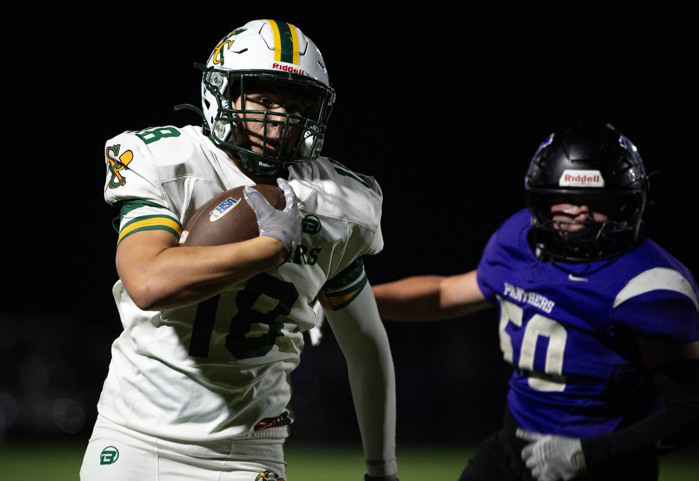 Coal City's Aiden Scrogham carries the ball on a play for a touchdown against Manteno on Friday, October 3, 2025.