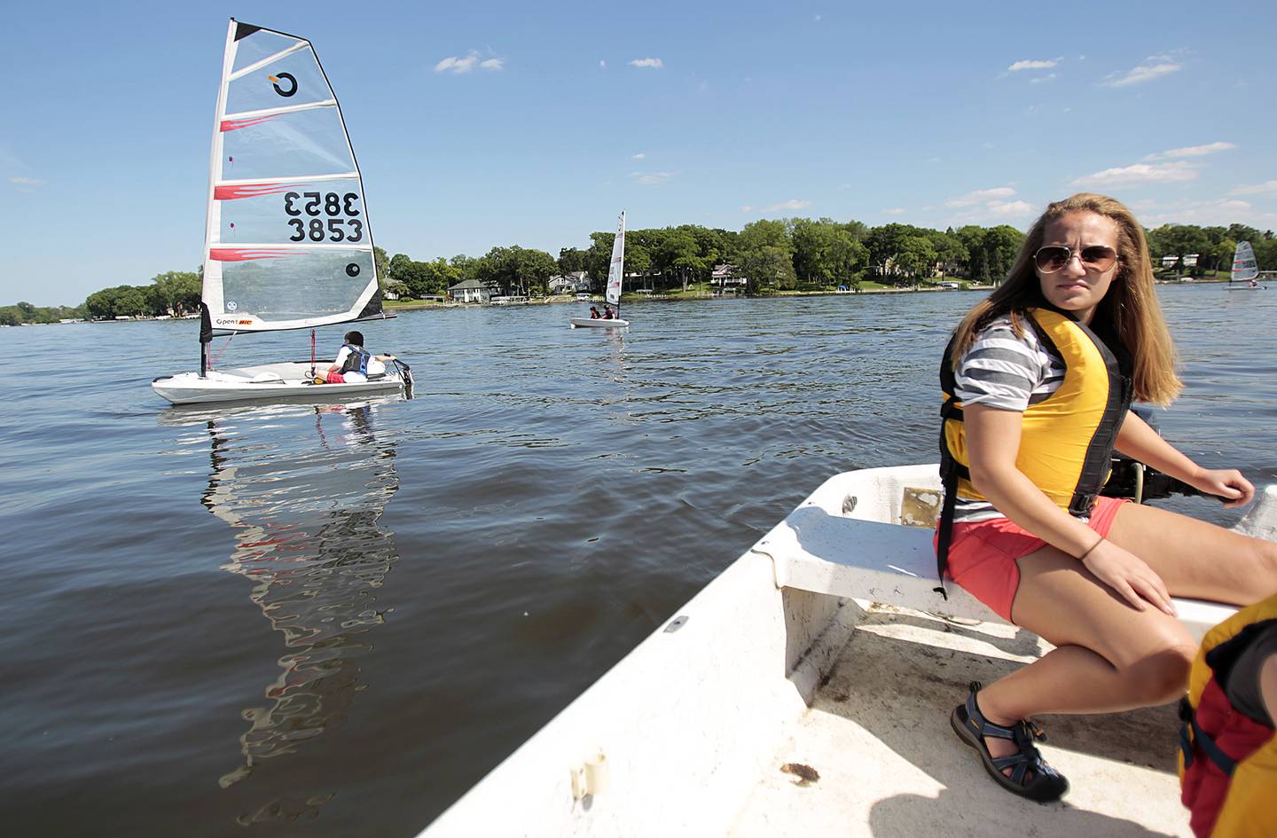 Sailing instructor Cortney Kingsley, 17, of McHenry watches as students operate sailboats on Pistakee Lake. Kyle Grillot - kgrillot@shawmedia.com
