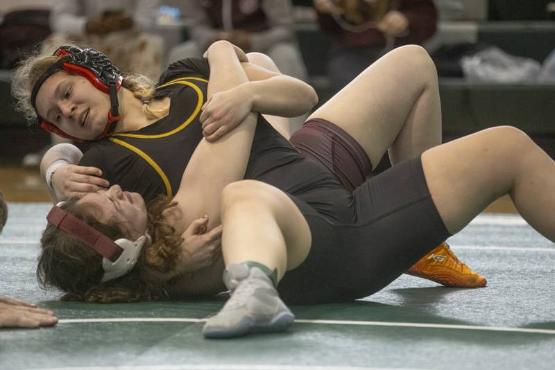 Bailey Herr of Putnam County defeats Patience Riggs to secure her entry into the  IHSA girls wrestling state championship during sectionals at Geneseo High School on February 10, 2024.