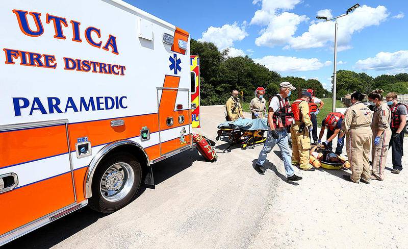 Utica EMS, Ottawa River Rescue and OSF Life Flight crew, transport the fall victim into the Utica ambulance at the Starved Rock Lock and Dam. The accident happened at about 1:45 p.m. Tuesday.