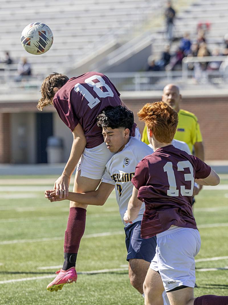 Sterling’s Jose Castor and Dunlap’s Samuel Ott collide Saturday, Oct. 21, 2023 in the regional finals game in Sterling.