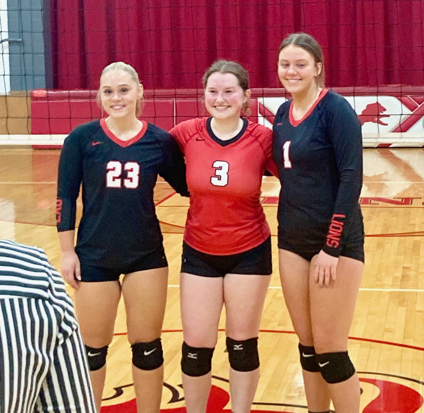 LaMoille's three seniors, Taylor Wamhoff (left), Ella Ryan and Grace Kelly, celebrated senior night with their first win of the season.
