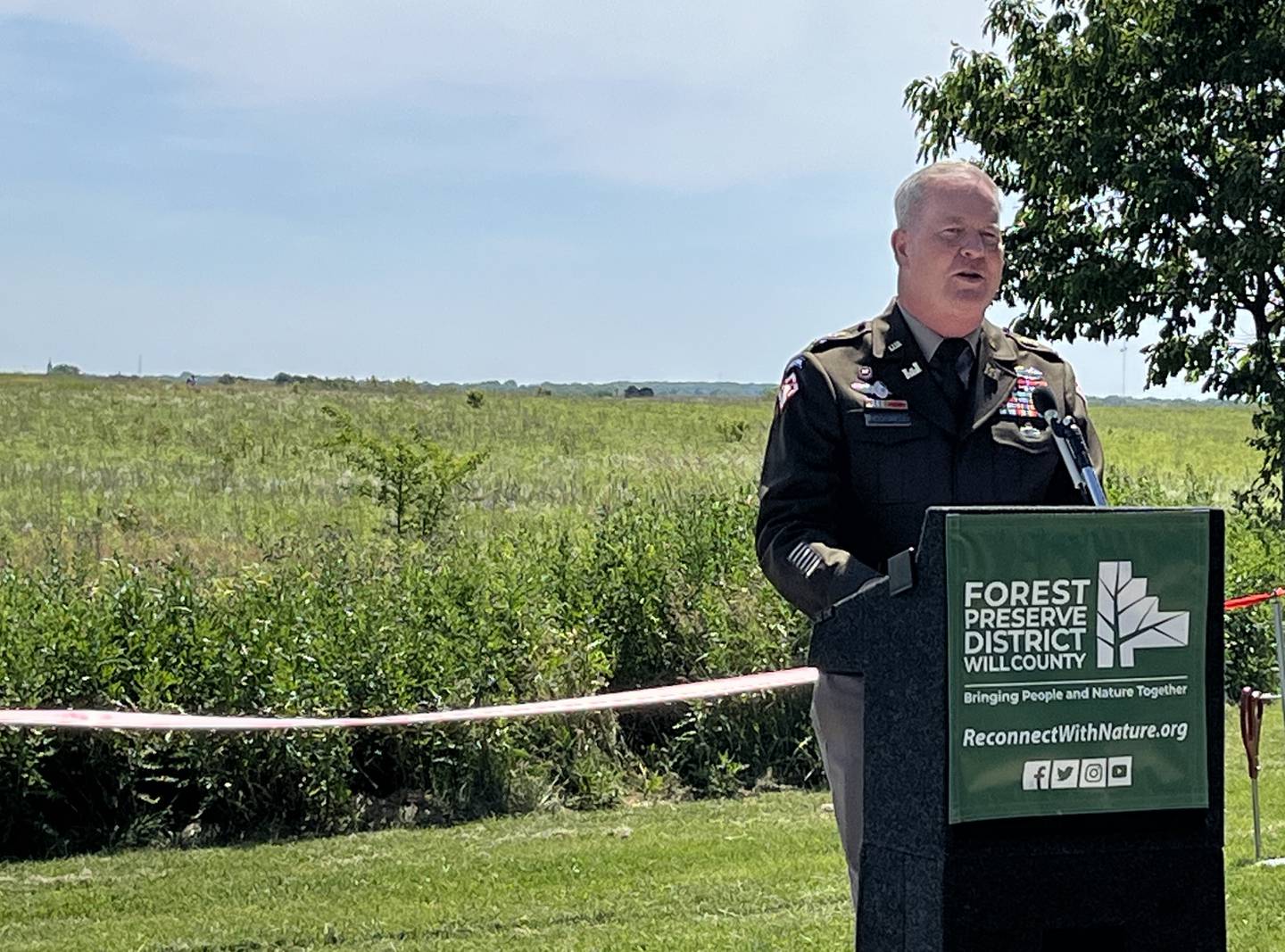 Col. Kenneth Rockwell, commander of the U.S. Army Corps of Engineers Chicago District, speaks at a ribbon-cutting ceremony held on Friday, May 31, at the Prairie Bluff Forest Preserve in Crest Hill. The ceremony celebrated an ecosystem restoration project.