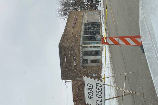 Roof of downtown Woodstock business collapses, road shut down amid concerns of further damage