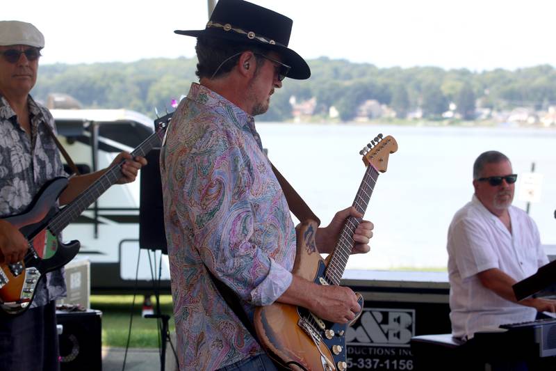 The Wall of Denial Band entertains during the final day of Bands, Brews, and BBQ at McHenry’s Petersen Park Sunday. The three-day event was hosted by the McHenry Area Rotary Club and 100% of the proceeds will go to charities such as Kids in Need McHenry County, McHenry Riverwalk Shoppes and more.