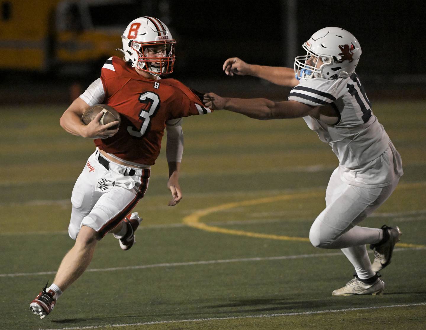 Benet Academy quarterback Ryan Kubacki is caught by Saint Viator’s Allistar Kanyuh in a football game at Benedictine University in Lisle on Friday, Sept. 20, 2024.