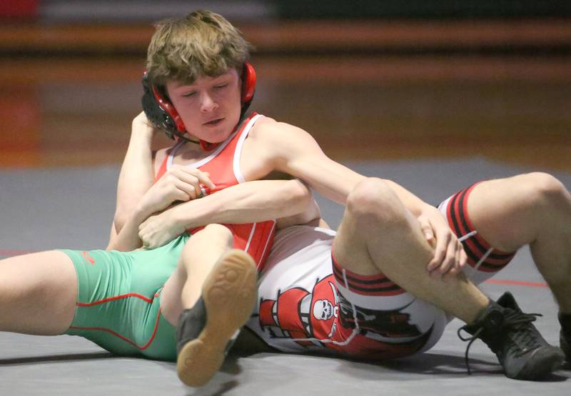 L-P's Gianni Verucchi wrestles Ottawa's Ryan Rowe on Thursday, Jan. 9, 2025 in Sellett Gymnasium at L-P High School.