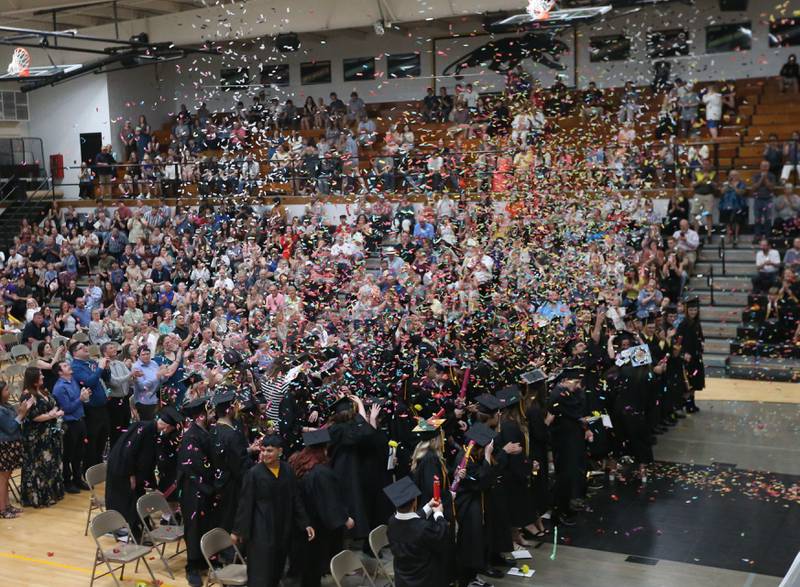 The Putnam County Class of 2023 release confetti blasters after graduating during the Class of 2023 graduation ceremony on Sunday, May 21, 2023 at Putnam County High School.