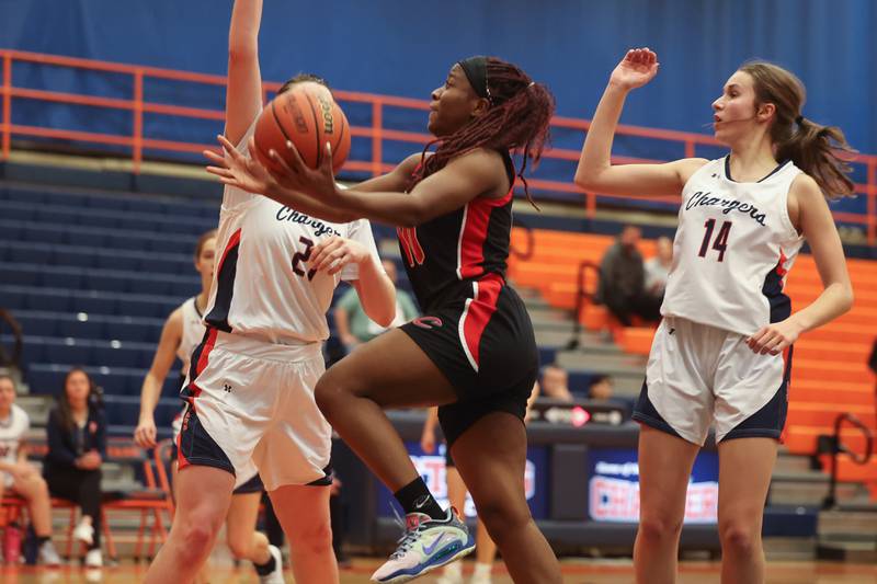 Lincoln-Way Central’s Kiya Newson-Cole goes in for the layup against Stagg on Monday, Dec. 11th, 2023 in Palos Hills.