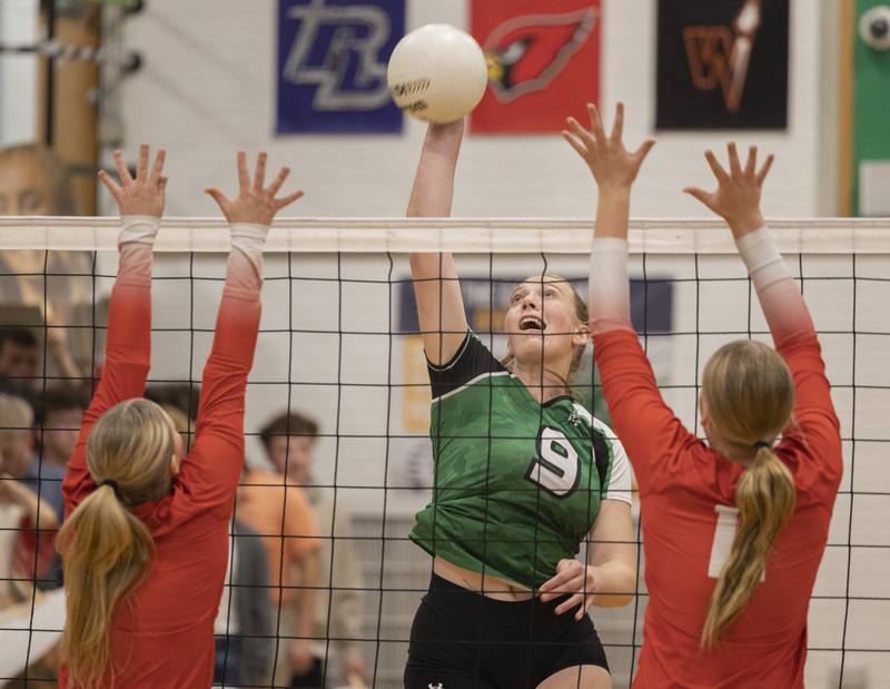 Rock Falls' Kayla Hackbarth hammers the ball against Oregon Wednesday, Oct. 22, 2025.