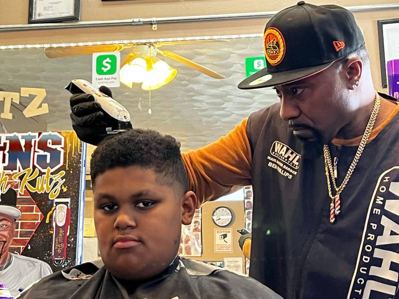 Derek Breslin of Sterling gets a fade from Ben Phillips, owner of Ben's Phresh Kutz, on Tuesday, Jan. 24, 2023 in Rock Falls.
