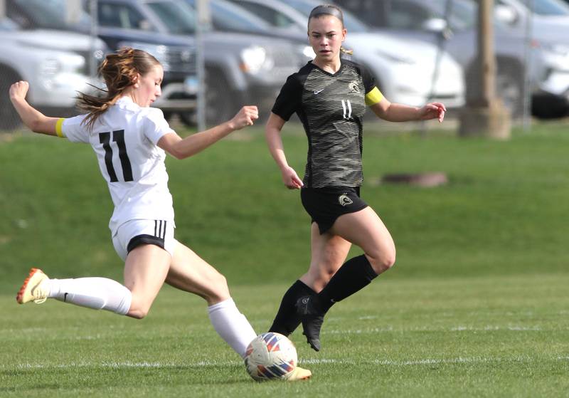 LaSalle-Peru's Danica Scoma tries to get a shot off in front of Sycamore's Olivia Conery during their 2023 game at Sycamore High School.
