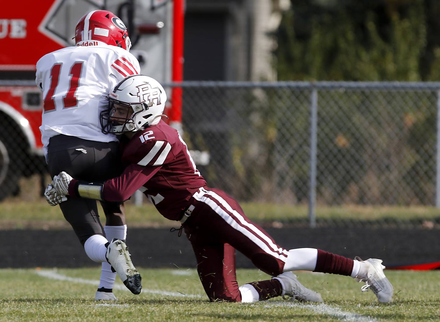 Prairie Ridge's Travis Dittmer tackles Chicago Goode's Jayden Patterson-Veal inside the five yard line as Patterson-Veal tries to return a kick off during an IHSA Class 5A first-round football game on Saturday, Nov. 2, 2024, at Prairie Ridge High School in Crystal Lake.