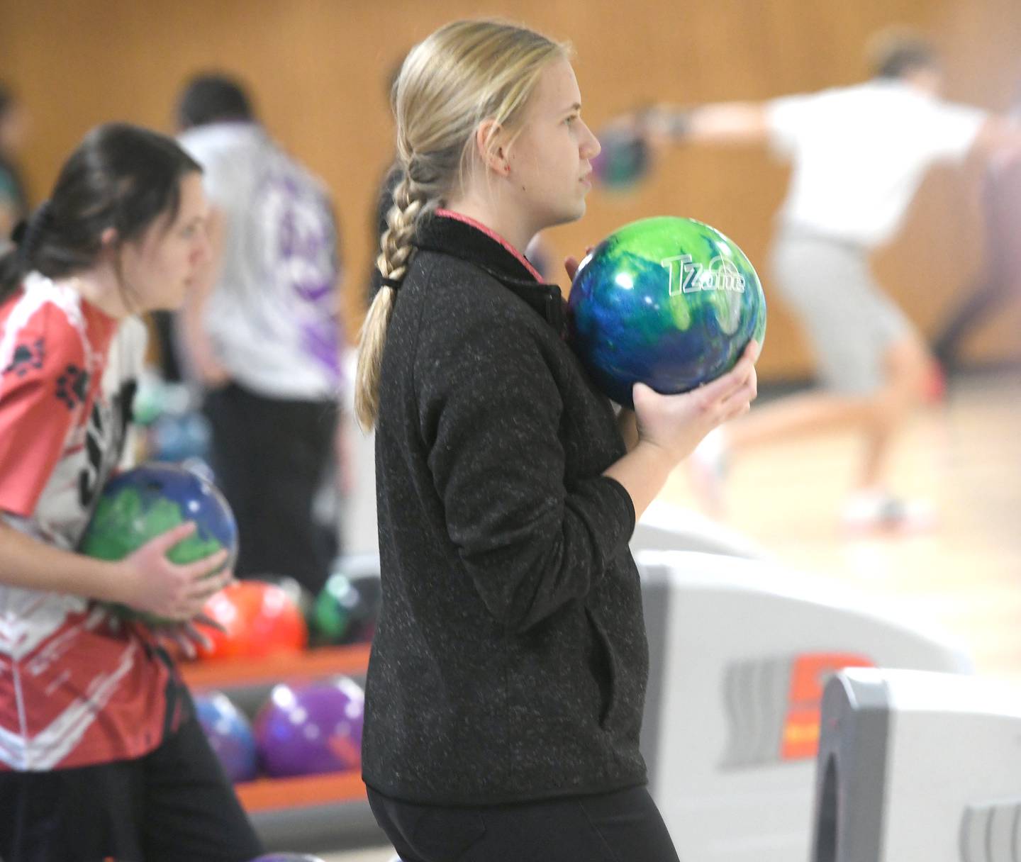 Erie-Prophetstown's Lillian McWilliams looks at the pins as she bowls  at the Hawk Classic on Dec. 3 at Plum Hollow in Dixon.