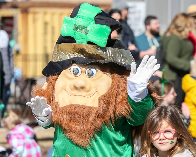 A leprechaun marches in the Lemont St. Pat's Day Parade on Saturday, March 8, 2025  in Lemont.