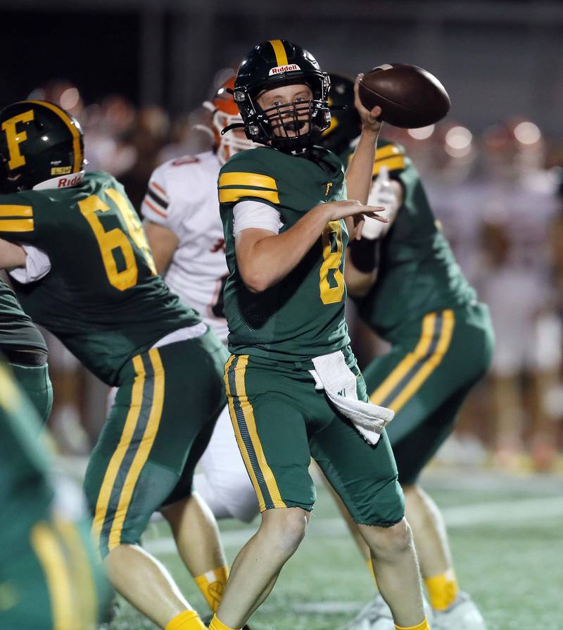 Fremd's John O'Brien (8) looks for an open teammate against Hersey Friday September 1, 2023 in Palatine.