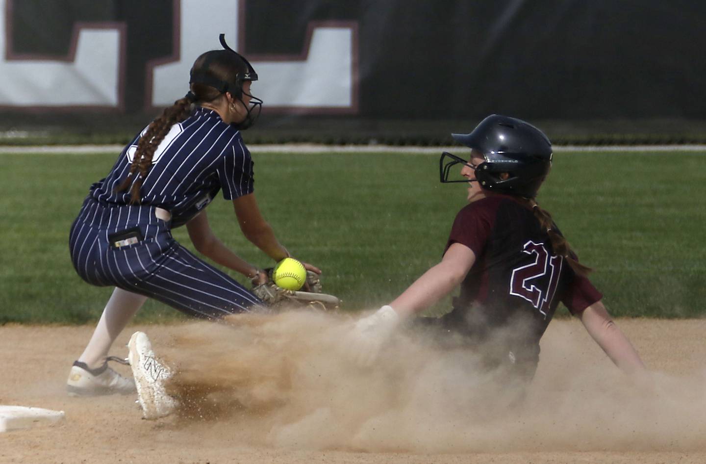 Prairie Ridge's Mary-Kate Center slides into second bas as Cary-Grove’s Holly Streit waits for the throw during the Class 3A Prairie Ridge Regional Championship softball game on Friday, May 22, 2026, at Prairie Ridge High School.