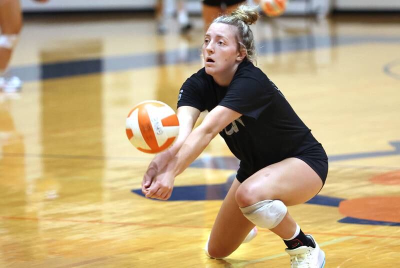 Genoa-Kingston's Alayna Pierce makes a dig Tuesday, Aug. 23, 2022, during volleyball practice at the school in Genoa.