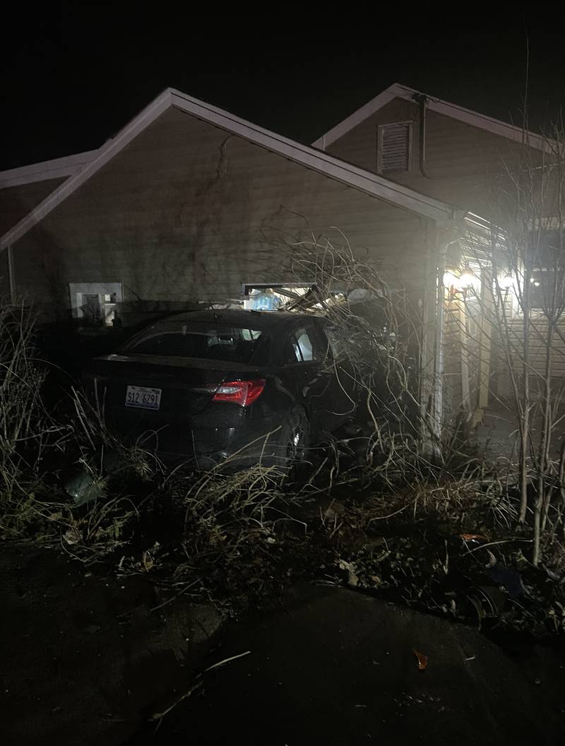 A vehicle crashed into the Crystal Lake home of Danielle Irwin on Monday, March 20, 2023, causing damage to her garage, car and belongings.