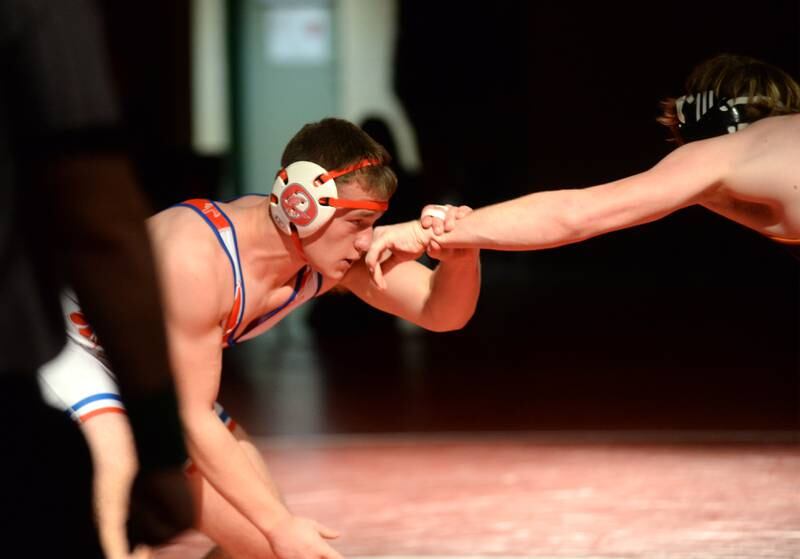 Oregon's Seth Rote grabs the wrist of  his Sandwich opponent in the 190-pound match at a triangular meet with Morrison on Friday, Jan. 31, 2025 in the Blackhawk Center at Oregon High School.