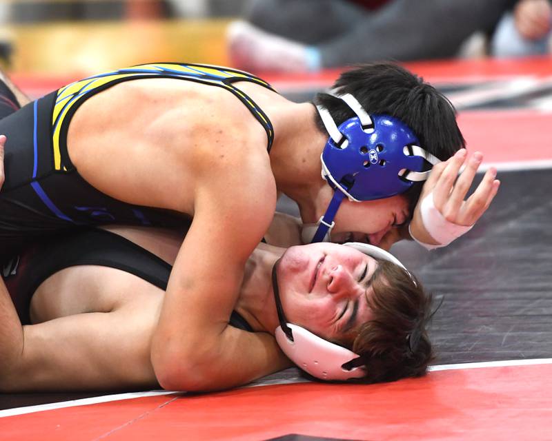 Amboy's Jose Lopez (bottom) battles Johnsburg's Kainoa Ancog in the championship match at 157 pounds at the Stillman Valley Holiday Tournament on Saturday, Dec. 20, 2025 at Stillman Valley High School.