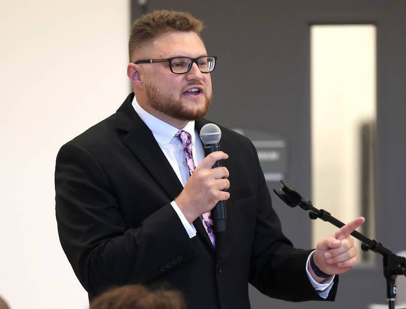 DeKalb School Board president Christopher Boyes speaks Friday, Aug. 8, 2025, during the grand opening celebration for the new Dr. Leroy A. Mitchell Elementary School in DeKalb.