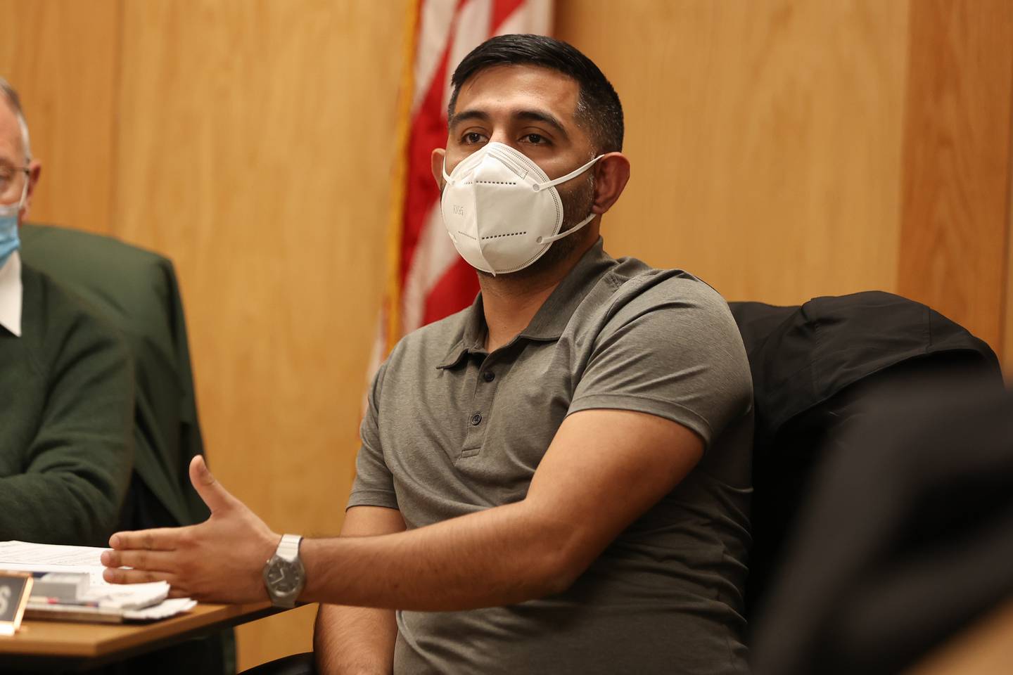 Angel Contreras Joliet Township Trustee Supervisor speaks to a resident during the Joliet Township regular board meeting. Tuesday, Feb. 8, 2022, in Joliet.