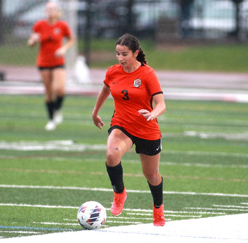 Crystal Lake Central’s Addison Schaffer dribbles the ball down field during the Class 2A state championship game against Triad at North Central College in Naperville on Saturday, June 1, 2024.