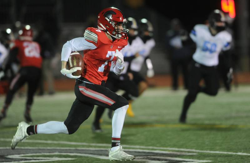 Maine West's defense fails to stop Deerfield's Luke Jones on his 54-yard punt return for a touchdown in the season opener at Deerfield High School on Friday.