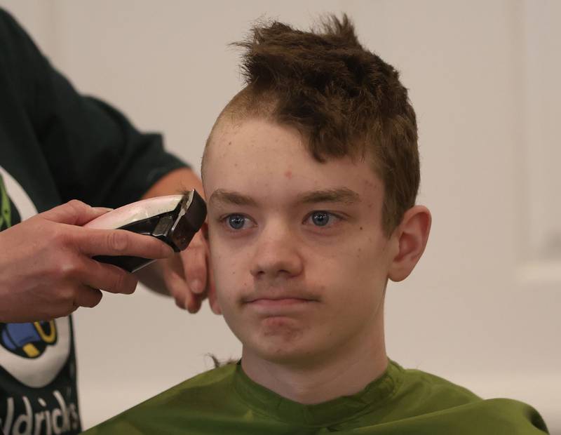 Matthew Brown has his head shaved during the 19th annual Illinois Valley Emergency Services Annual St. Baldrick's Event on Sunday, March 22, 2026 at Senica's Oak Ridge in La Salle.