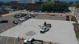 Photos: Crews pave parking lot at OSF St. Elizabeth in Peru 