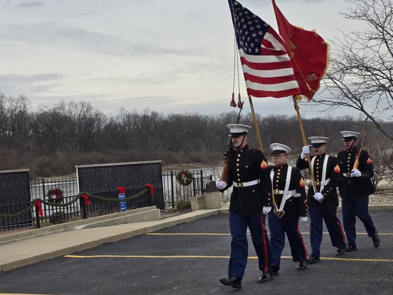 The Color Guard presents the flags Saturday, Dec. 14, 2024, at the Middle East Conflict Wall in Marseilles during a Wreaths Across America ceremony.