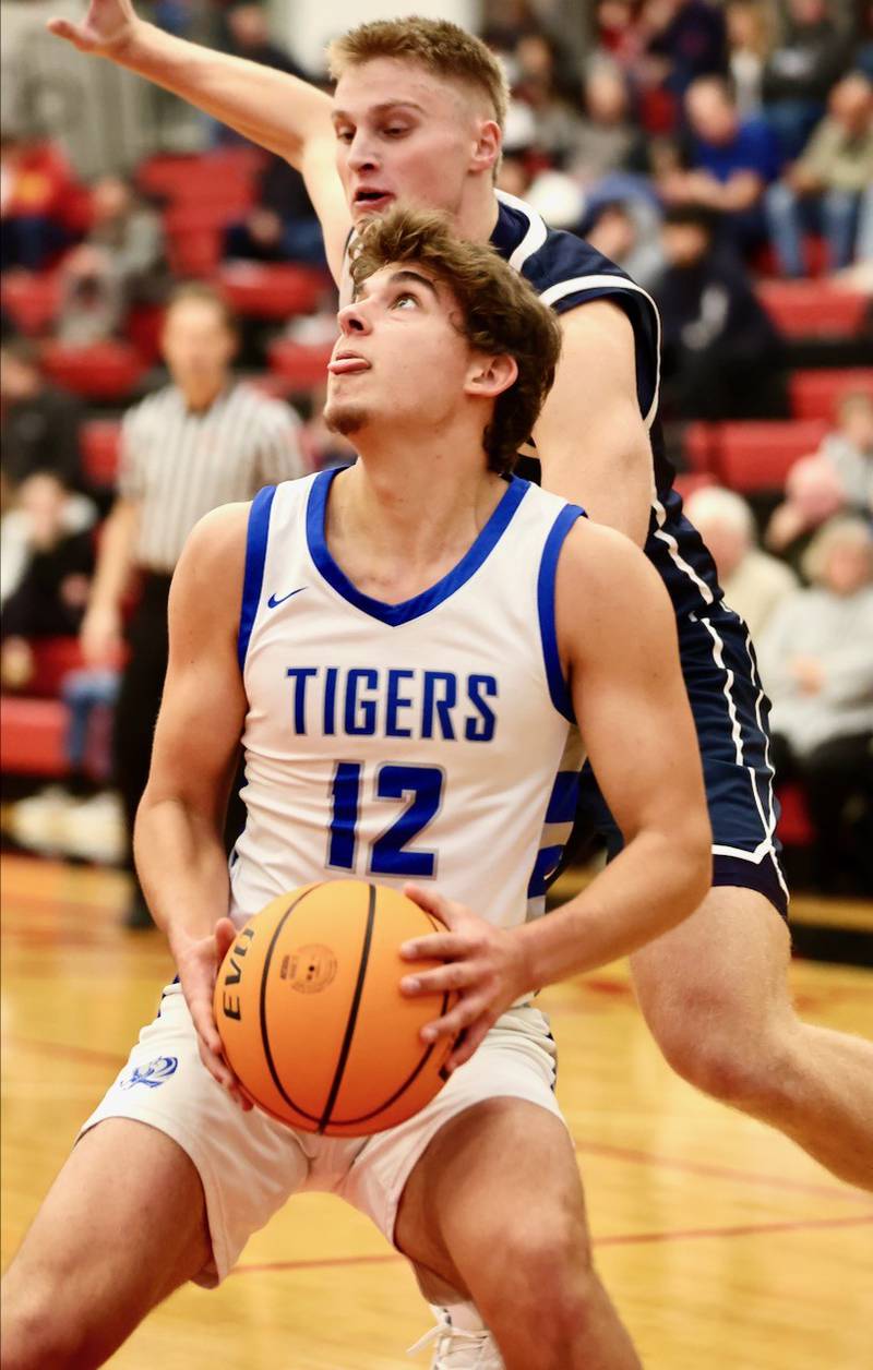 Princeton's Asa Gartin eyes the hoop against Fieldcrest Tuesday night at Hall High School.