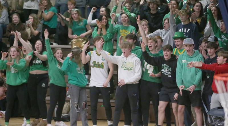 Seneca super fans cheer on the Irish as they play Marquette on Friday, Feb. 21, 2025 in Bader Gym at Marquette Academy.