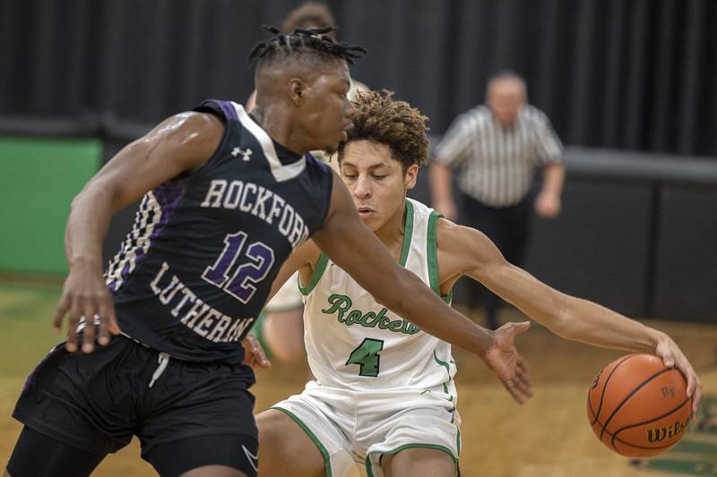Rock Falls’ Devin Tanton handles the ball against Rockford Lutheran’s Kyng Hughes Friday, Feb. 3, 2023.