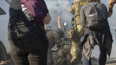 Tear gas used amid protest at suburban ICE facility; congressional candidate pushed to ground