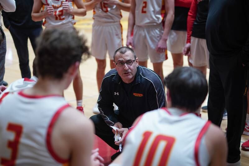 Batavia’s head coach Jim Nazos talks to his team during a break in play against Marmion during a basketball game at Batavia High School on Wednesday, Nov. 27, 2024.