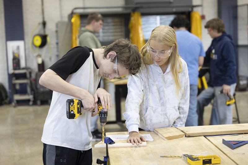 Dealon Gonzales and Lacey Updike work on their bluebird house Monday, Nov. 10, 2025, in Joel Penne's Technical Math class at SHS.