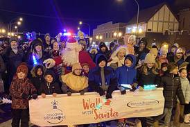 Photos: Sycamore area children walk with Santa to kick off holiday season downtown