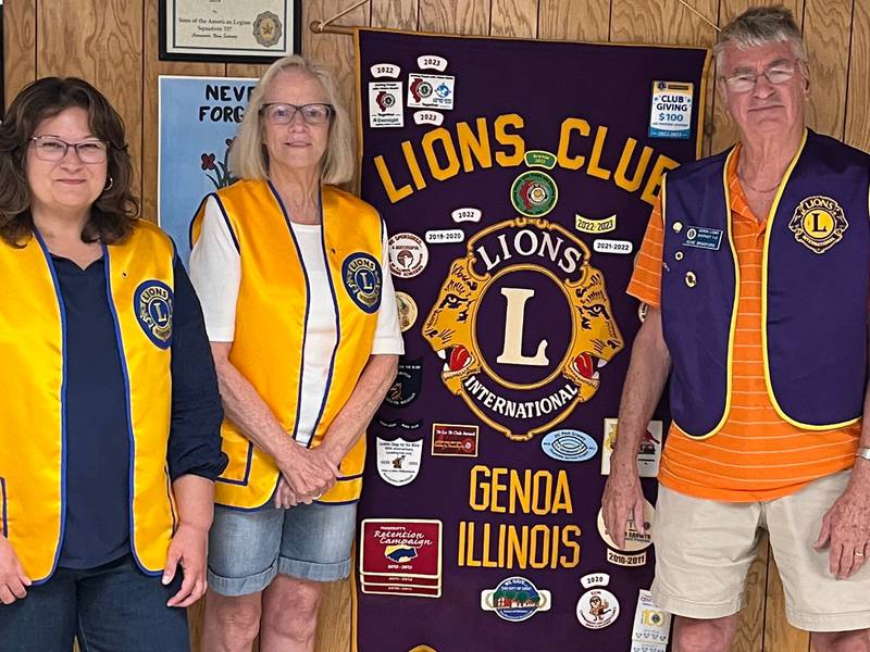 Genoa Lions Mary Brandes, Barb Siskna, and Genoa Lions president Gene Bradford