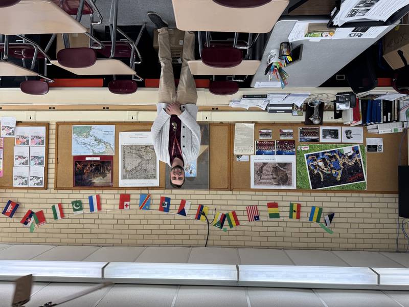 Steven Custer in his ESL classroom at Morris Community High School on Monday, March 10, 2025.