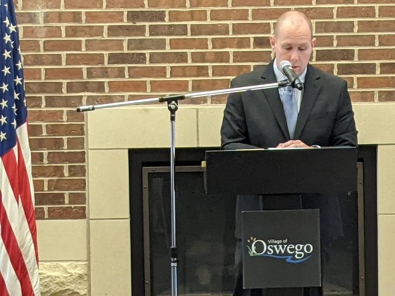 New Oswego Village President Ryan Kauffman makes a few remarks after being sworn into office Tuesday.