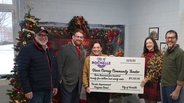 City of Rochelle presents facade grant to Vince Carney Community Theater
