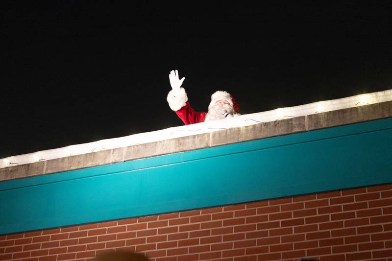 Santa arrives on the rooftop  downtown Geneva for the Annual Geneva Christmas Walk on Friday, Dec. 5, 2025 in Geneva.